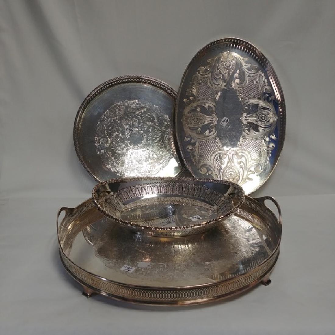 Five Reticulated Silver Plated Trays: Two with handles and a menorah stamp; Silver Plated on Copper, Made in Sheffield England; Cavendish Plate EP Copper, England; and a hallmarked tray. 10-3/4" ; 10"; 13-1/2"; 14"