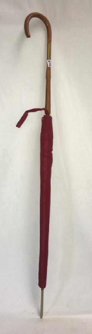 Vintage Red Silk Umbrella: Red silk umbrella with cherry wood and gilt metal shaft. Original silk protective sleeve. 33" long