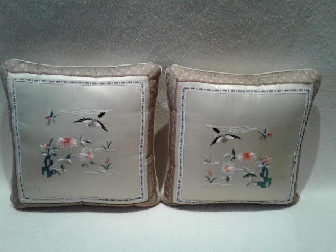 Pair Embroidered Silk Throw Pillows: Pair embriodered silk throw pillows. Scene of bird and flowers. Zippered closure. 14" sq.
