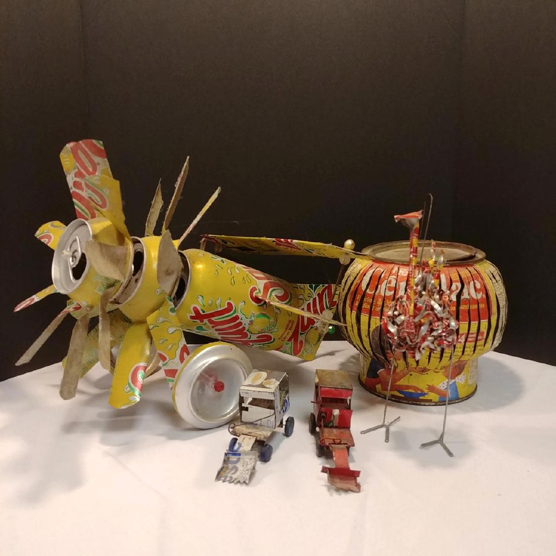 Lot of Mexican Tin Folk Art: Airplane; Lantern; Ostrich; two Front End Loader Machines. Ostrich measures 6-3/4" H
