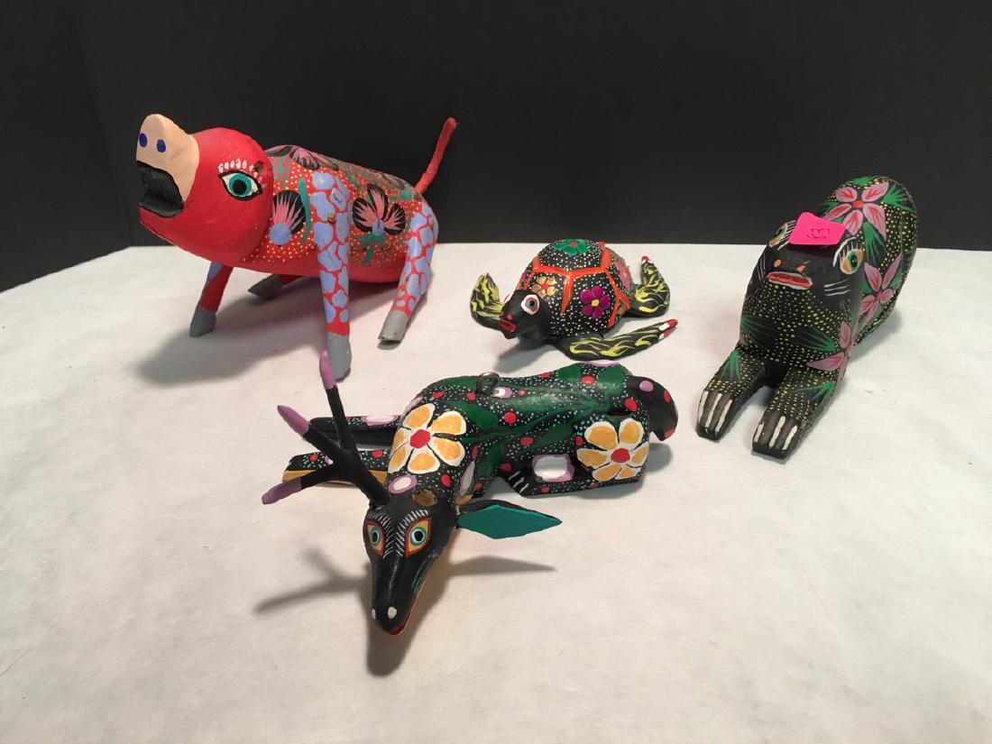 Mexican Folk Art Carved Animals (4): All beautiful and colorful but "as-is" with missing parts (ears, horn, tail, etc) Deer is signed Signed Jose Olivera Perez. San Martin Tilcujete, Ocotian, Oaxaca. Cat is signed Juan Ojada. 5" L the pi