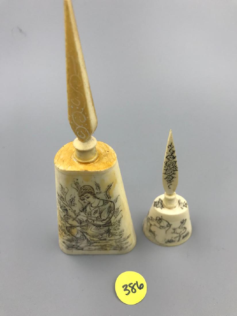 Middle Eastern Camel Bone Perfume Bottles (2): Hand painted and decorated with figures on each side. One is playing an instrument. Removeable stopper. Together with a smaller bow and arrow hunting themed perfume in "as-is" condition. 6" H x 2" W; 