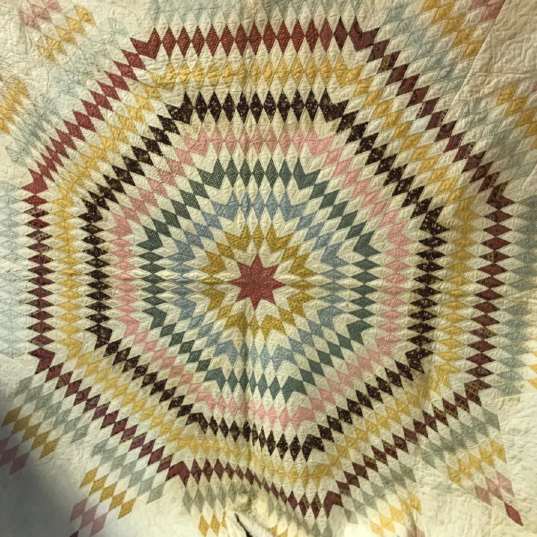 Antique Quilt Sunburst of Stars: Star of Bethlehem quilt. Beautiful condition except for the discoloration. No visible rips or tears. Significant discoloration at the reverse some due to the brown fabric. Beautiful hand quilting with