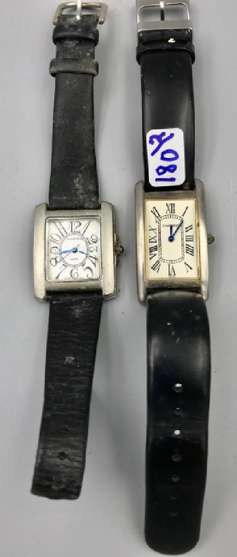 Two Watches Marked Cartier: Both Marked Swiss and Cartier on the face. Reverse of one is marked Christian Daniel, Swiss Mov't stainess steel back, water resistant. Blue gem in each stem. 1-3/4" H; 1-1/2" H