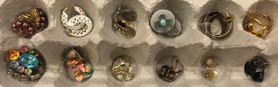 Dealer Lot of Costume Earrings (12): Mixed lot of clip, screw back, and pierced earrings including large multi colored rhinestone pierced.