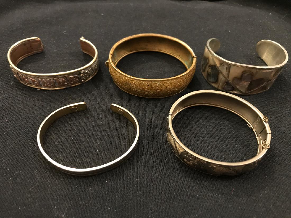 Lot of Vintage Bracelets (5): Engraved Atlantic City, 1942; Mexican Silver with Abalone; brass floral decorated; one with character writing in applied copper.