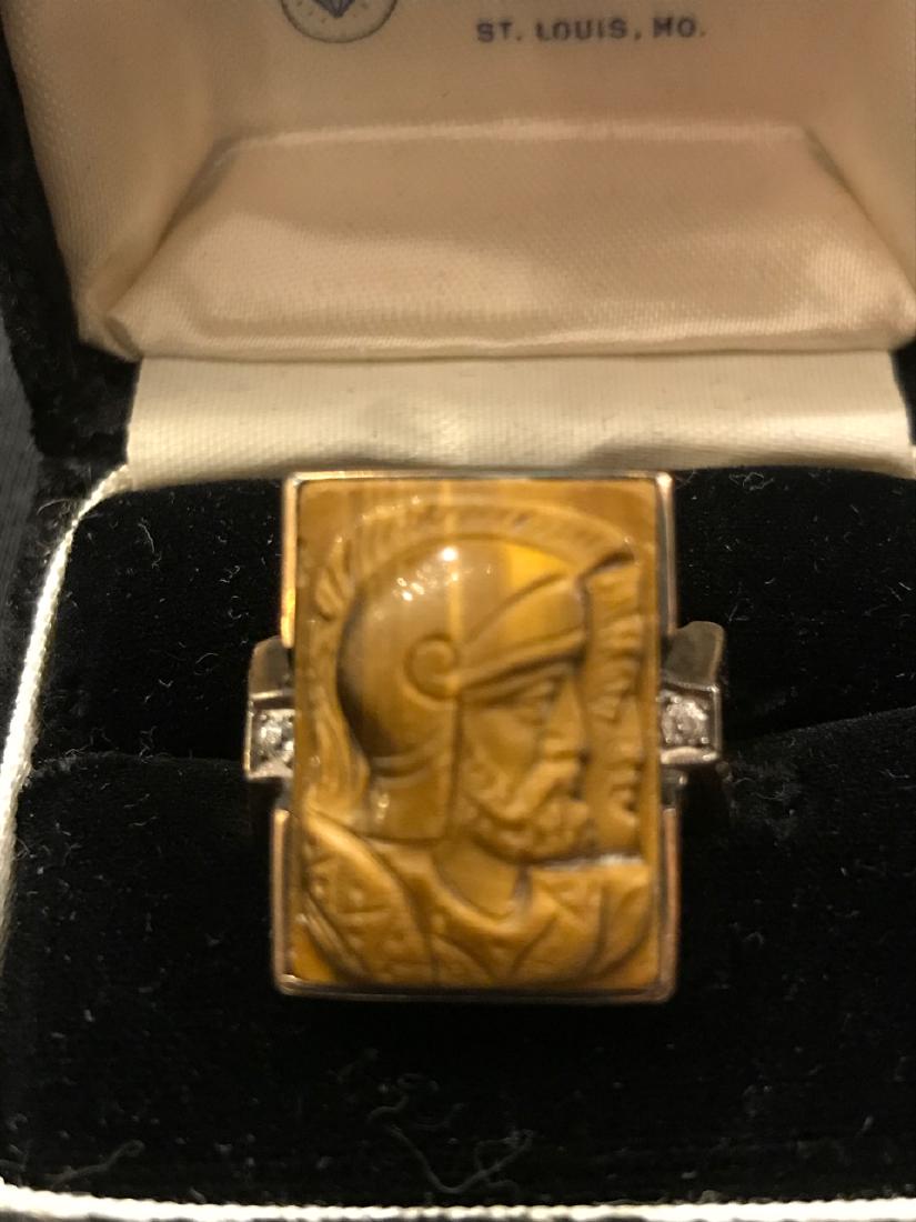 Tiger Eye Carved Intaglio 10K Gold Ring: Large tiger eye man's ring. 14K gold with two small diamonds at either side of the tiger eye. Ring has separated at the bottom and should be reconnected but could be used as is. Intaglio is 7/8" H x 5
