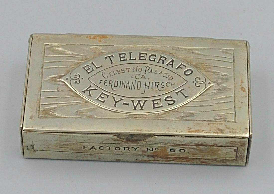 El Telegrafo Cigars Match Safe: Figural brass pocket match safe for Ferdinand Hirsch Co.â€™s El Telegrafo brand Key West cigars. Marked Celestino Palacio YCA, El Telegrafo, Key-West. Factory No. 60. A nicely detailed miniature