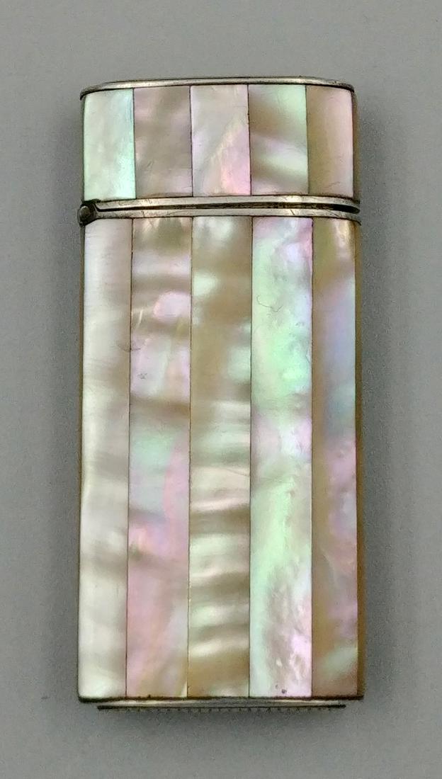 Silver Plated Mother of Pearl Match Safe: Diminutive mother of pearl decorated silver plated match safe. Flip top to open. Striker at the base.