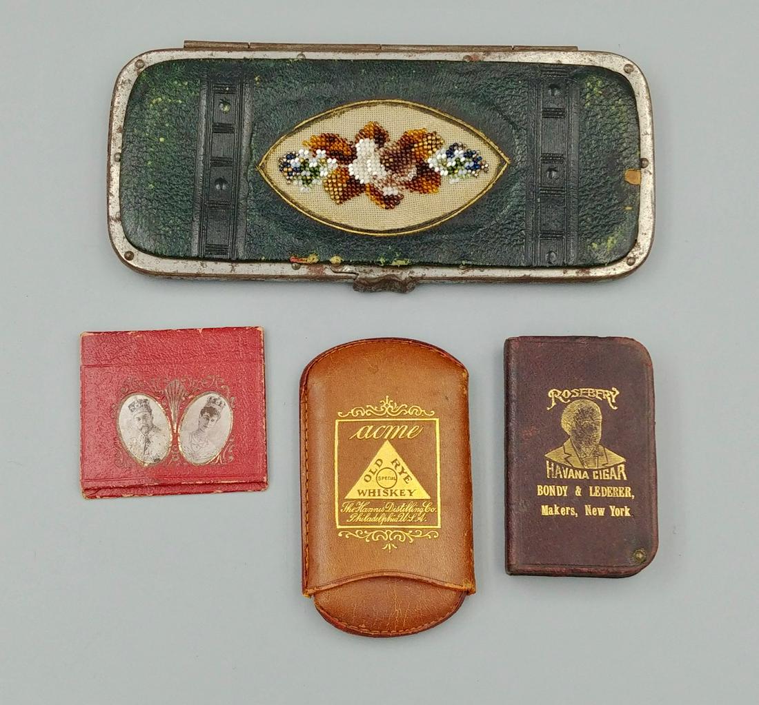 Lot of Leather Match Safes (4): Black leather case with embossed horse head and initials for C.H. on one side and beadwork at the reverse. Plated metal frame. Red interior and applied striker.; Brown leather with swing out tray for