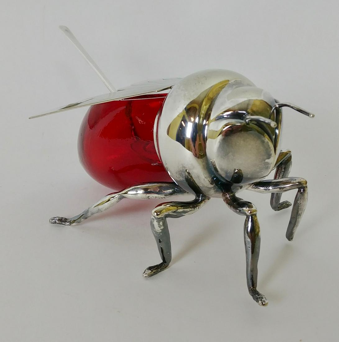 Mappin & Webb Ruby Red Firefly Dish: Mappin & Webb Prince's Plated Silver & Red Glass Firefly Jelly Dish by London & Sheffield. Marked The piece is signed on the underside of the wings: "TRIPLE DEPOSIT Mappin & Webb's Princes Plate Londo