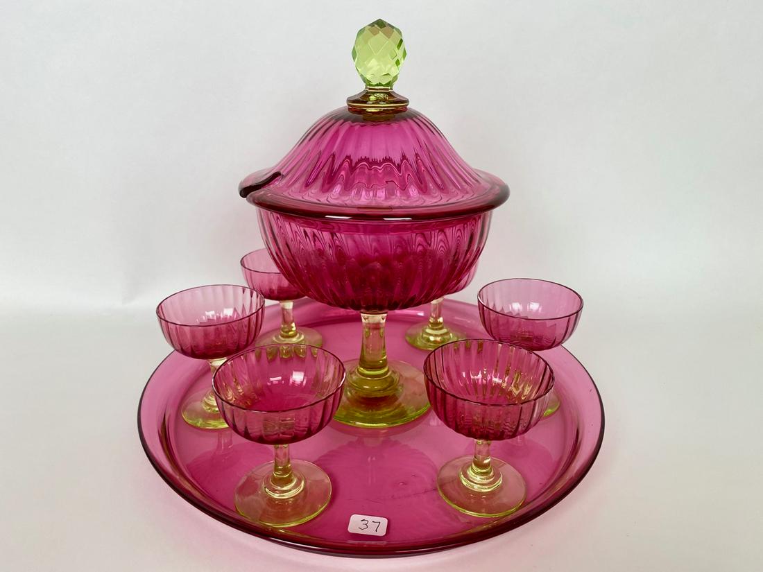 Beautiful Cranberry Glass Dessert Set: Cranberry and vaseline glass dessert or sorbet set with footed tureen (no ladle) on round tray. Paper label reads: Grand Depot Porcelaine et Faience, E. Bourgeois, Rue drouot, 21, Paris, Succursale, R