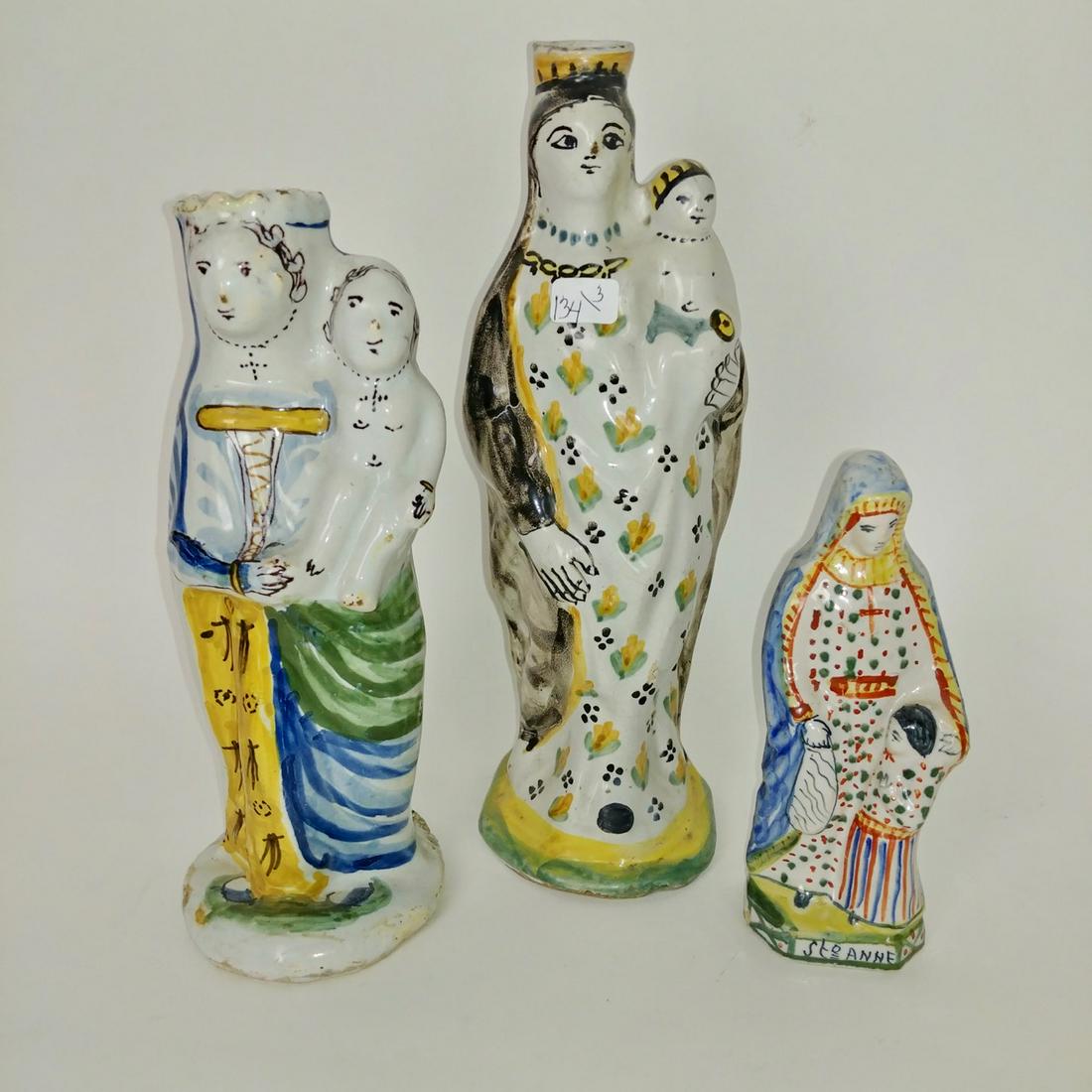 French Faience Madonna Candle Holders and Quimper St.: Two are candle holders and the third is a signed Quimper St. Anne with child standing next to her. 9.5" H; 8.5" H; 5.75" H
