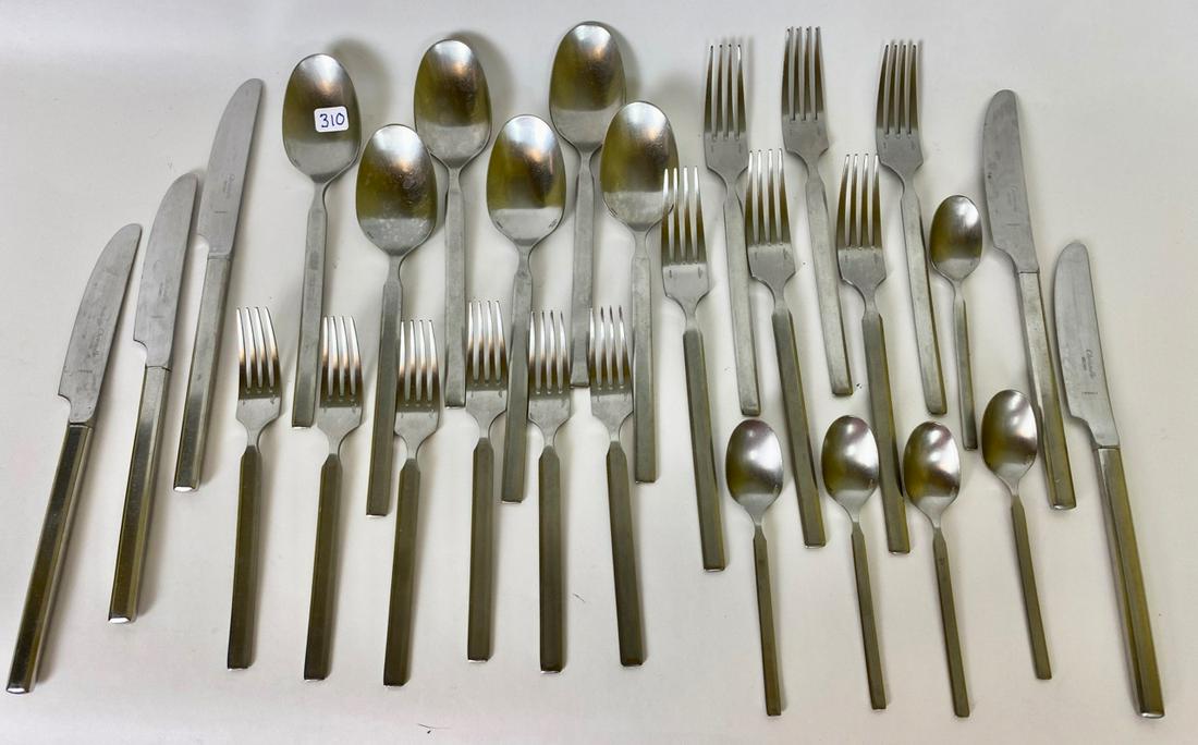 Christofle Stainless Steel Amica Flatware (28): Including 6 dinner forks; 6 soup spoons; 6 salad forks; 5 teaspoons; and 5 knives. 8" L