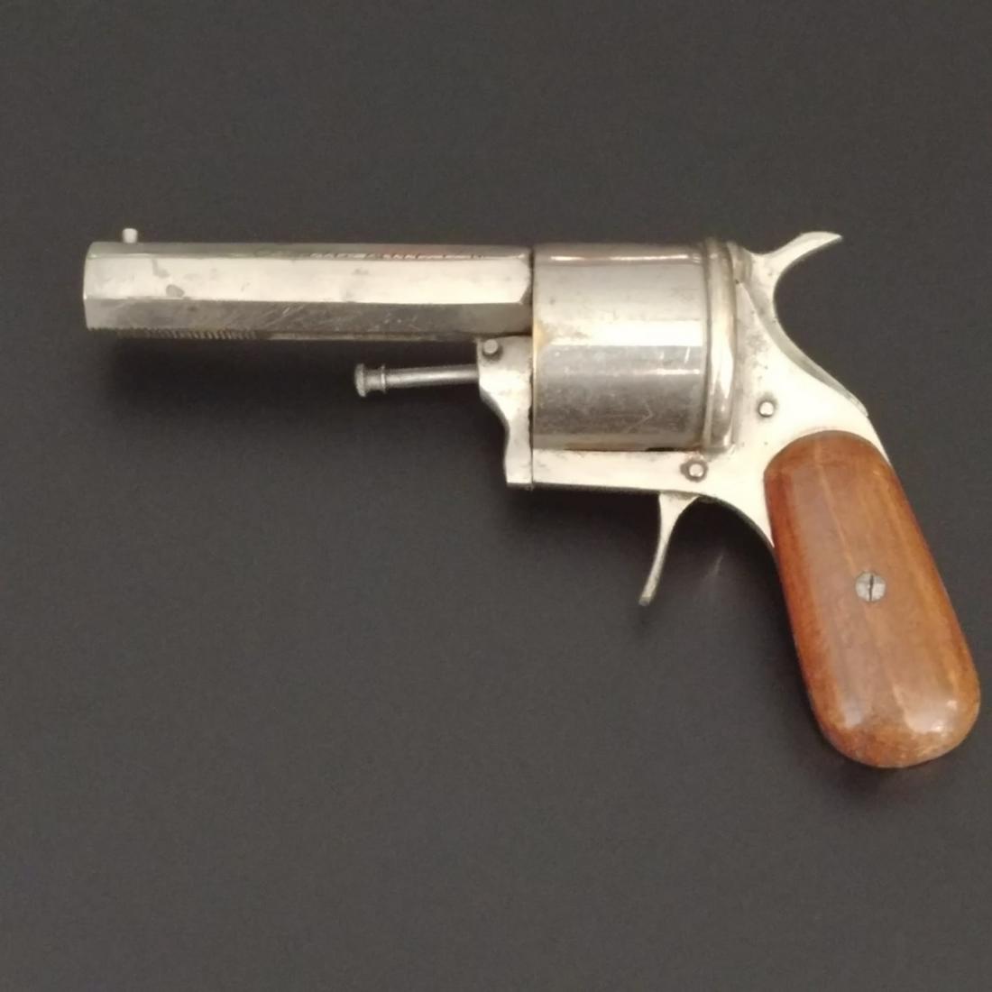 Pistol Safe & Cutter Combo: Pistol shaped match safe and cigar cutter. The hammer is the cutter. Mechanism pulls back and trigger releases to cut. Safe is the barrel. Advertisement for Gordon Food Company, Coatesville, Pa. Nicke
