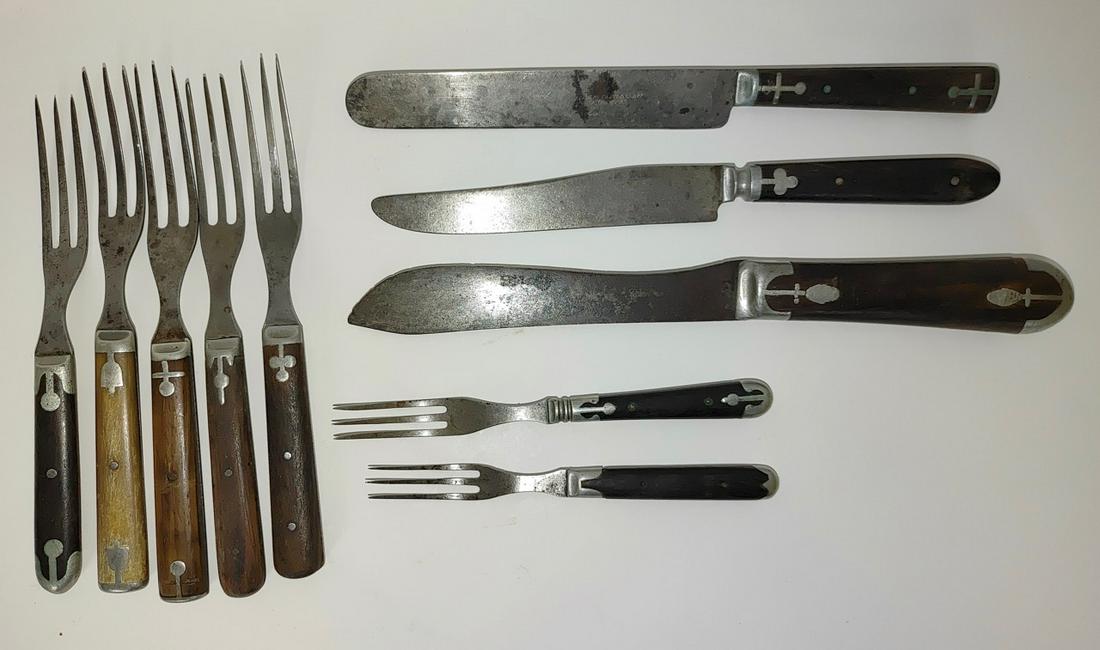 Goodell Forks and 3 Knives: Seven 3 tine forks and 3 knives.