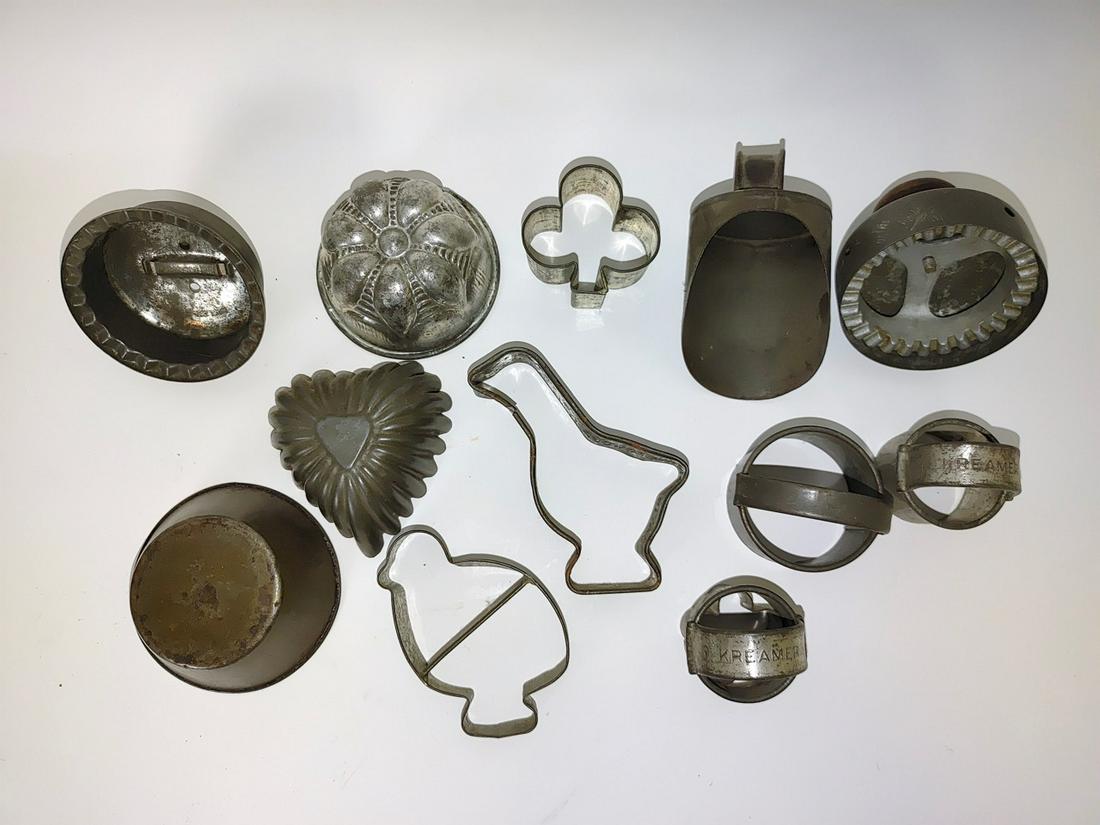 Lot of Early Cookie and Bisquit Cutter, Molds (12): Davis Baking Powder Duck cutter is 4" tall. Kreamer cutters, etc. Varying sizes.