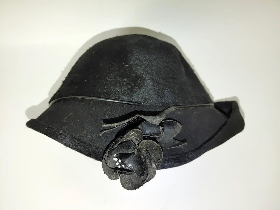 Black Gwen Pennington Flapper Cloche: Italian made. With black rose decoration. True size unknown but cloche is small.
