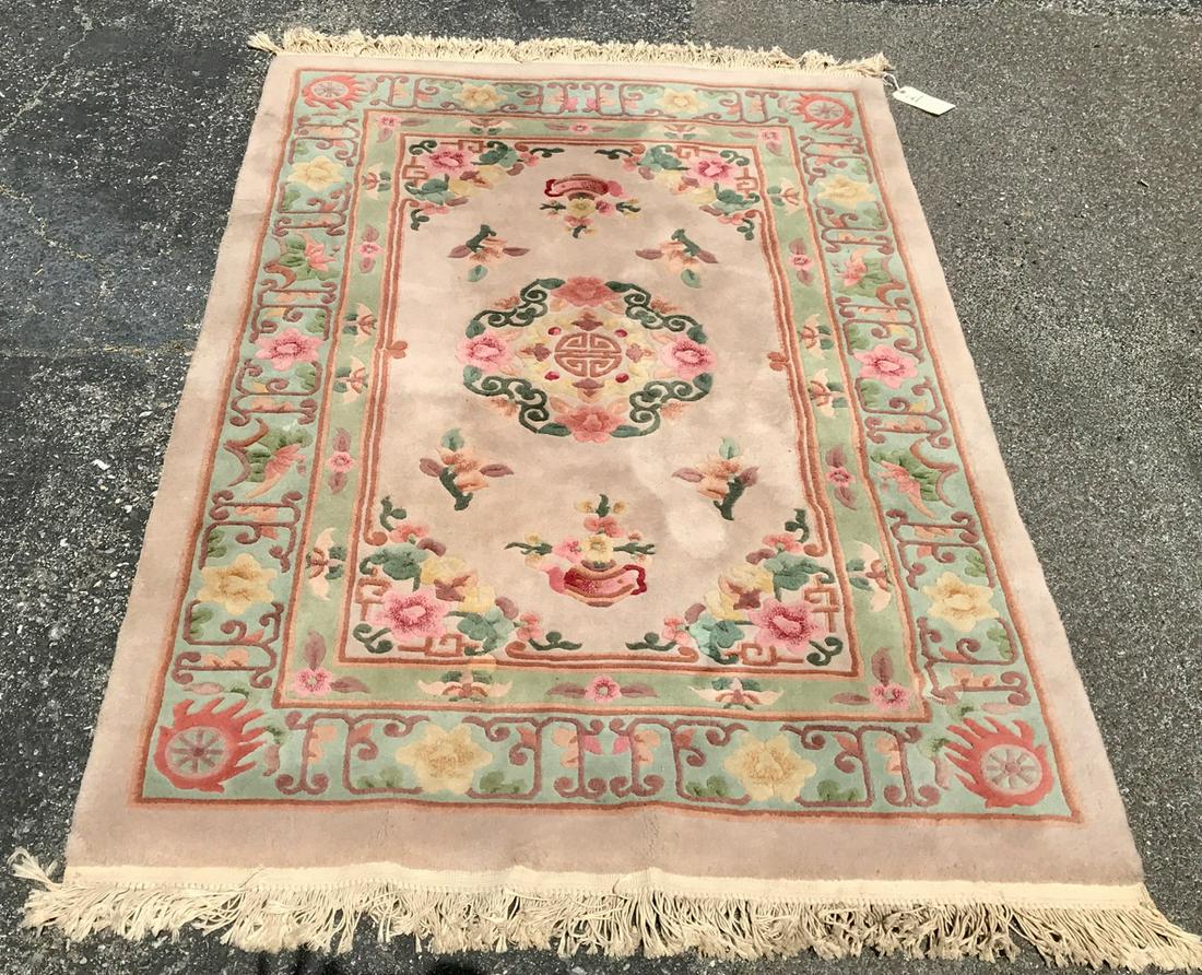 Chinese Carpet: Tea kettle and floral motif. 74" x 45"