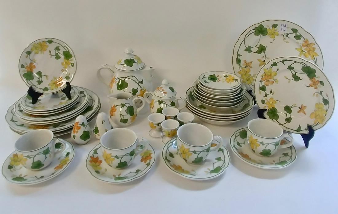 Villeroy & Boch Geranium Service for 4 (41 pieces): Includes: 4 dinner plates (10.5"); 4 Salad plates (8.25"); 4 soup bowls (8"); 4 bread plates (6.5"); 4 cereal bowls (6"); 4 berry bowls (5"); 4 cups and saucers (3" H and 6.5"); tea pot (7" x 5" x 8.5