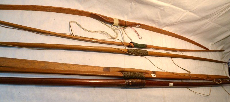 Lot of Six Vintage Archery Bows: Six wood bows including Abercrombie & Fitch Special; L.E.Stemmler, Manorville, NY; F.M. Ayres Ltd. Manufacturers London, 36; and three unmarked. All approx. 66" long