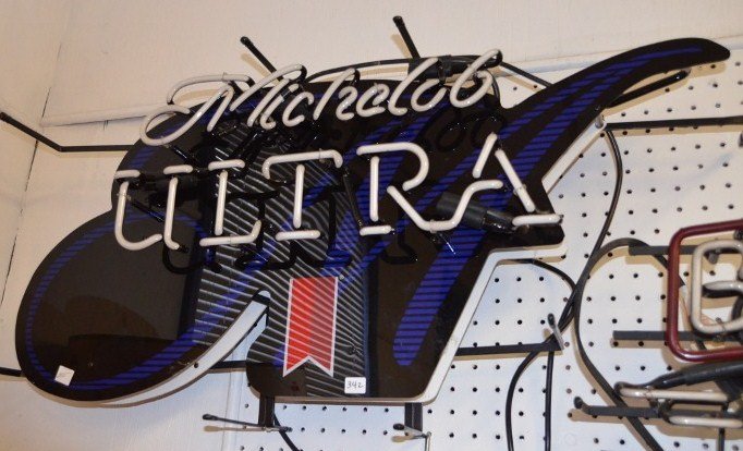Michelob Ultra Neon Bar Sign: Blue and black with red ribbon. 36" x 17"