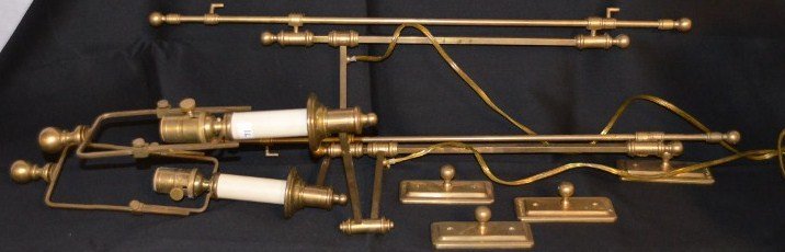 Pair Ralph Lauren Kerry Swing Arm Wall Lamps: Pair Ralph Lauren Kerry Swing Arm Wall Lamps in natural brass. 35-1/2" high x 20-1/2" extended.