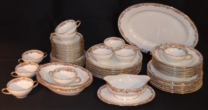 Antique Limoges Floral Banded China Service for Six: Marked in green on the bottom - France, Depose. C. Ahrenfeldt, Limoges. Made expressly for Ovington's, New York & Chicago. Patented. Pieces in the set include: 6 dinner plates; 6 luncheon plates; 6 so