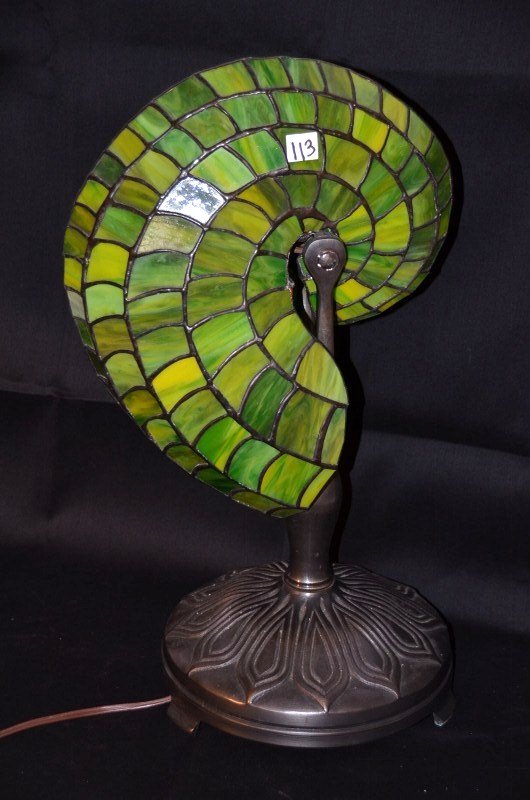 Dale Tiffany Nautilus Shell Table Lamp: Green glass nautilus shell shaped lamp on bronzed base. 21" high