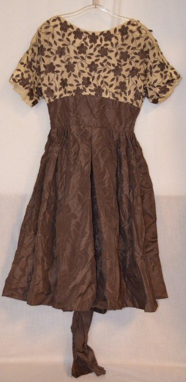 Vintage Taffeta and AppliquÃ© Saks Fifth Avenue Dress: Vintage Taffeta and AppliquÃ© Saks Fifth Avenue Dress. Brown taffeta with cream colored silk top appliquÃ©d with taffeta flowers and vines. Attached taffeta belt. Original fabric label reads, â��