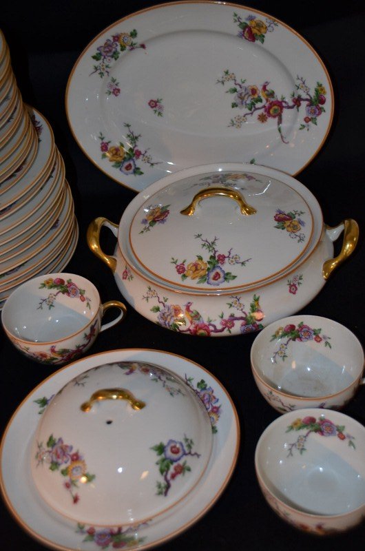 Limoges China Service: Floral pattern on off white china. Marked B. & Co. Limoges France. L. Bernardaud & Co. Limoges. Lot includes 12 Dinner plates; 11 Luncheon plates; 12 Bread plates; 12 Dessert plates; 7 Soup bowls; 6 c