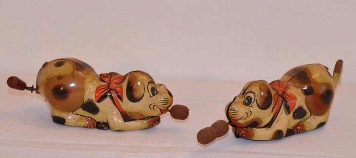 Tin Wind Up Dog Toys: Made in US Zone Germany. Missing key. Each measures 4-1/4" long.
