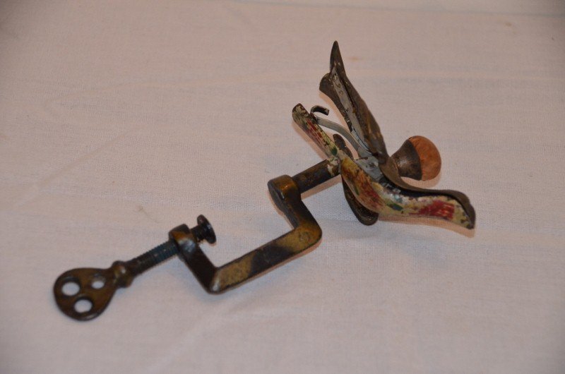 Antique Victorian Sewing Bird Clamp: With pin cushion. Brass and painted. Well used. 6" high