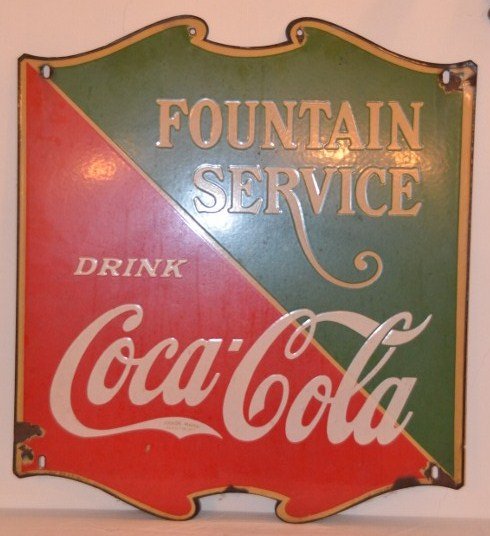 Vintage Coca-Cola Fountain Service Enameled Sign: Green and Red enamel / porcelain on metal Coca-Cola sign. Reads, "Fountain Service, Drink Coca-Cola." Made in USA. Tenn. Enamel. 25-1/2" high x 23" wide