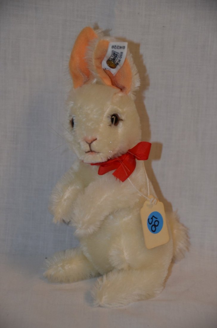Steiff Bunny Rabbit: White rabbit with Steiff ear tag. Paper hanging neck tag. 9" high