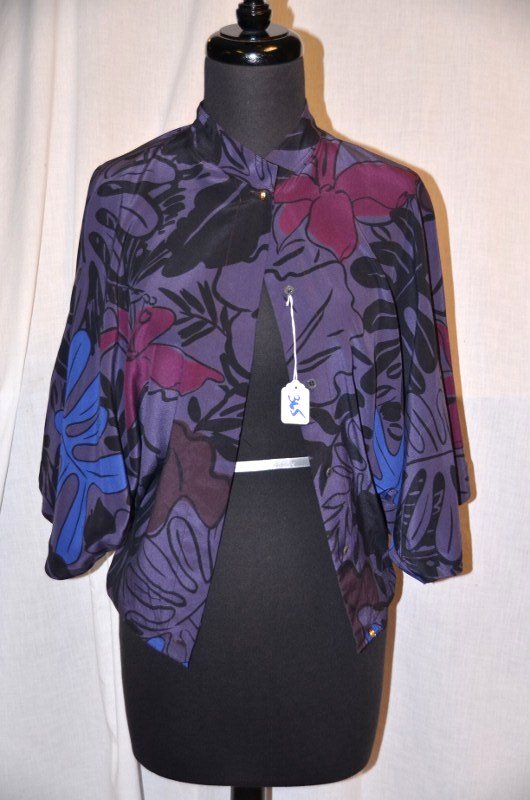 Gianni Versace Blouse: Size 40. 100% silk. Open back button front, blouse in purple, blue & maroon. NOTE: All clothing & accessories are in "as found in the closet" condition.