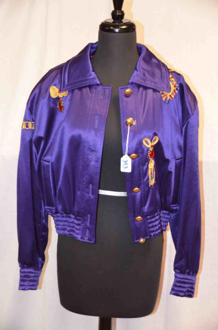 Escada Jacket by Margaretha Ley: Size 40. Purple jacket with red quilted lining. Gold and jewel embellishments. 65% new wool, 35% silk NOTE: All clothing & accessories are in "as found in the closet" condition.