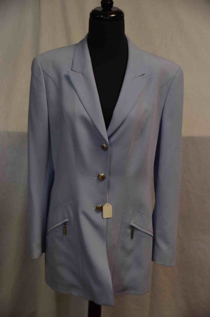 Escada by Margaretha Ley Blazer: Size 40. Long blazer with three silver buttons. Powder blue. Equestrian back with button. NOTE: All clothing & accessories are in "as found in the closet" condition.