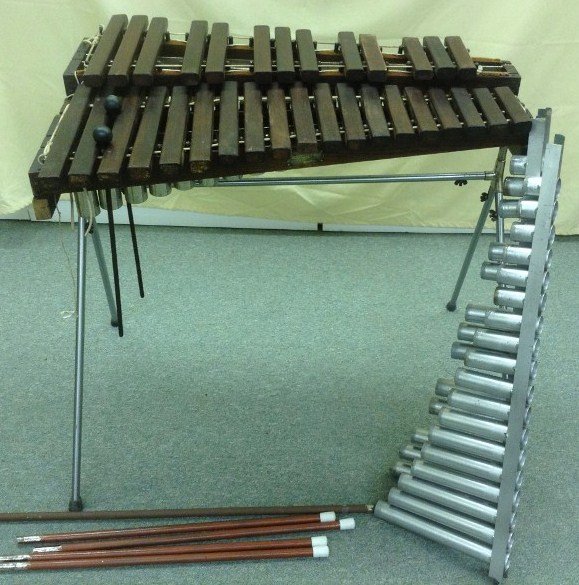 Antique Deagan Two and One-Half Octave Xylophone: Circa 1912. "Deagan Drummers Special Model" one of the first made -- Deagan catalog #842, Serial #9379. Original collapsible frame with rosewood bars, with second set of metal legs. Two sets of resona
