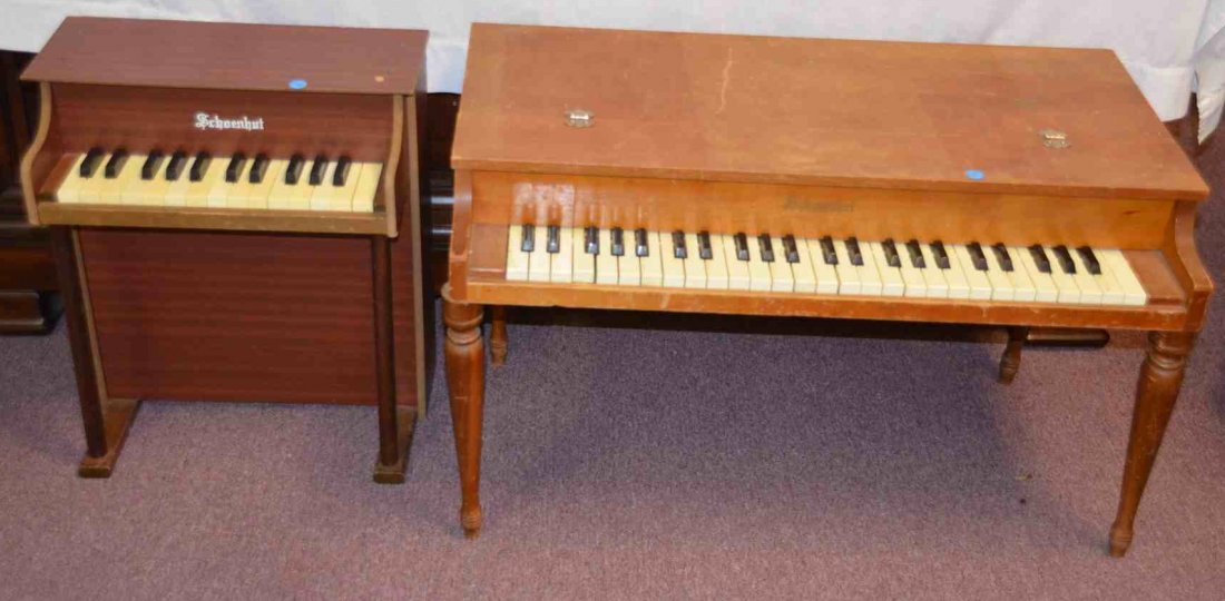 Two Schoenhut Upright Child's Pianos: Four octaves. The second is 2 octaves. 31" wide x 18" deep x 20" high; 21" wide x 16" deep x
