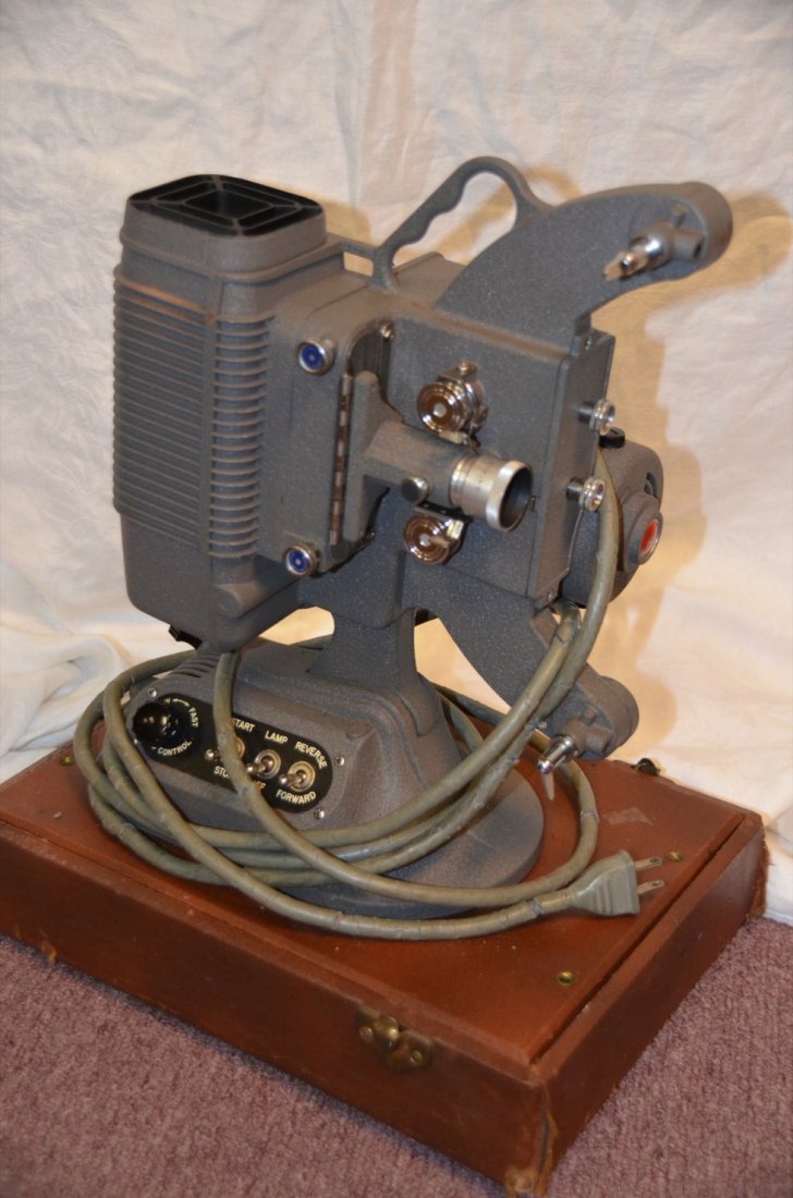 Dejur USA Model 750 8MM Projector: With projection screen.
