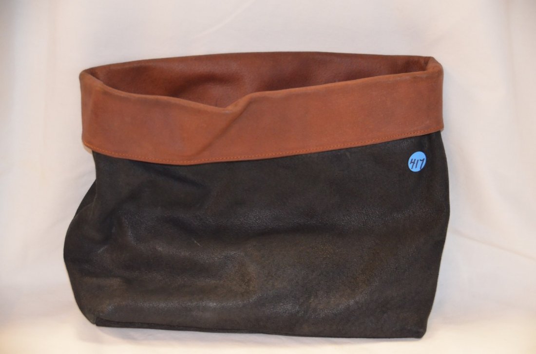 Donna Karan Leather Sack: Two tone purse with no handles or straps. 10" x 14"