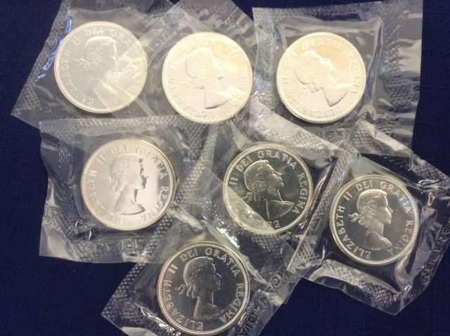 7 - 1964 Canada Silver Dollar Coins, Sealed: Elizabeth II Dei Gratia Regina Canada Dollar 1864-1964 Charlottetown Quebec Sealed in Canadian wrapping.