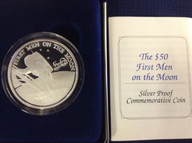 $50 First Men on the Moon Silver Proof Coin, 1989: $50 Dollar First Men on the Moon silver proof commemorative coin. 1989, Republic of the Marshall Islands, one Troy ounce of .999 pure silver, 31.11 grams, reeded edge, 38.61mm (Crown size).