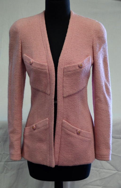 Vintage Chanel Pink Wool Blazer: With original fabric stock label that reads: Collection: PIE 92; Style: 28764; Fabric: G39; Composition: 100% Wool with Silk lining. Chanel Boutique. Written in red marker is NY SAMPLE. Pink nubby woo