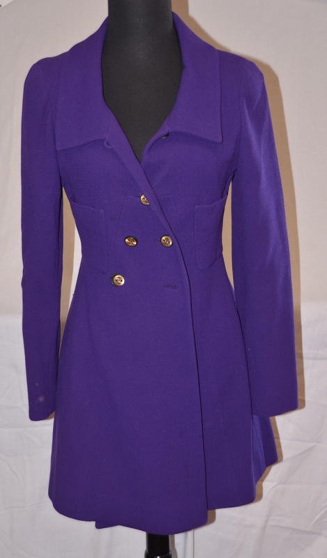 Vintage Chanel Purple Wool Blazer: Chanel Boutique fabric label. 100% wool with silk lining. Double breasted with five buttons (but one is missing as shown in photo.) Small button at collar with loop. Three buttons at each wrist. Three