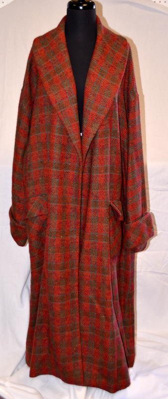 Vintage Chanel Wool and Cashmere Coat: With original fabric sample label that reads: Style: 25843; Size: M; Color: 83; 90% Wool and 10% Cashmere. Long red and green checkered coat with shawl color. Original sample piece of fabric in a plas