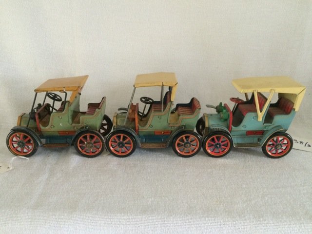 Lot of 3 Modern Toys Tin Cars: Colorful lithography. Two are lever action. In played with condition. Made in Japan. 5-1/2" long