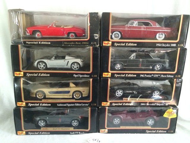 Lot of 8 Maisto Special Edition 1/18 Die Cast Cars: Lot of 8 Maisto Special Edition 1/18 Die Cast Cars including Audi TT Roadster; Mercedes Benz 190SL; 2004 Chevy Impala SS; Opel Speedster; and a Chevy Corvette 2003 Guldstrand. In original but somewhat