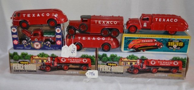 Lot of Texaco Die Cast Truck Banks (8): Seven by Ertl. Two 1920 Pierce Arrow Cab with tankers, two 1939 Dodge Airflows, and others. The 1940 Ford is marketed by K-Line Electric Trains, Chapel Hill, NC. 12" box size; 8" smallest length